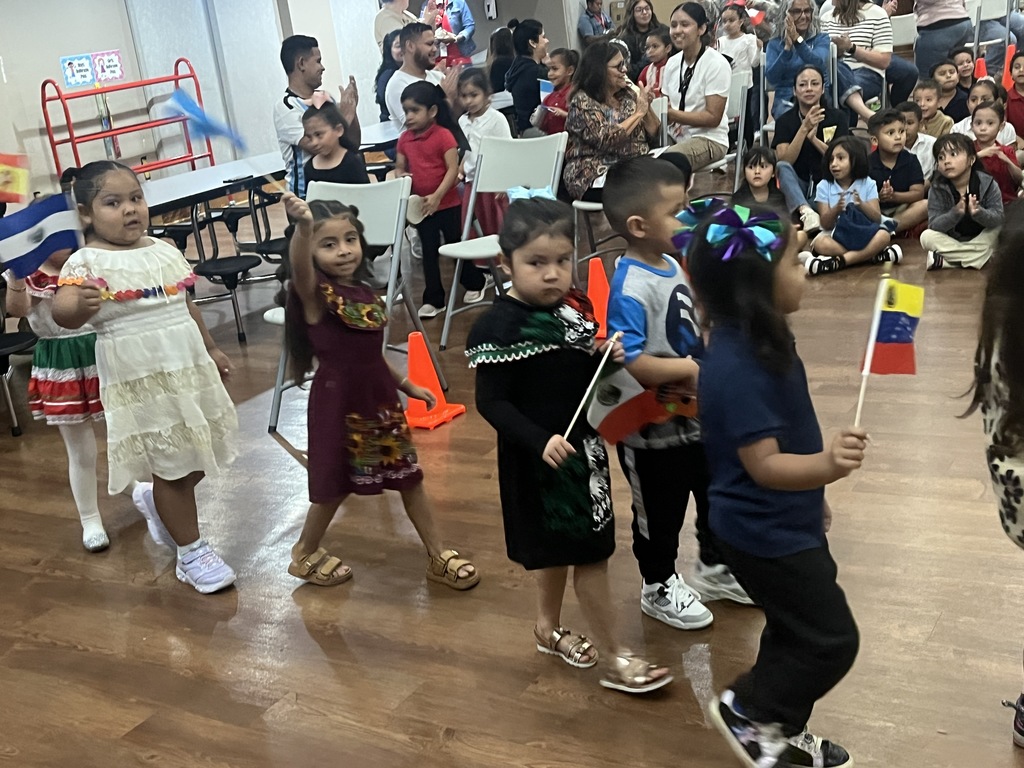 Students walking with flags 