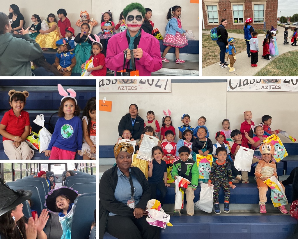 Costumed children collecting candy