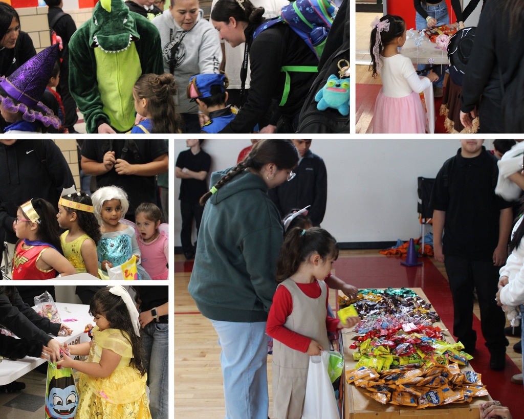 Costumed children collecting candy