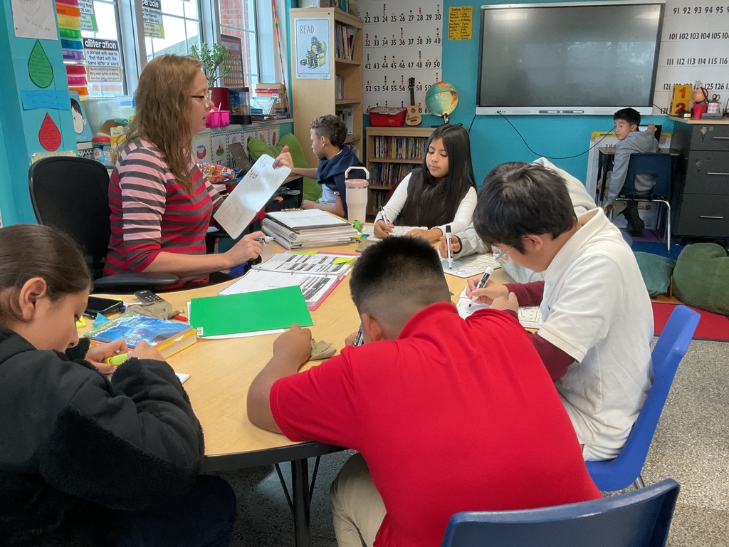 Teacher giving a writing lesson 