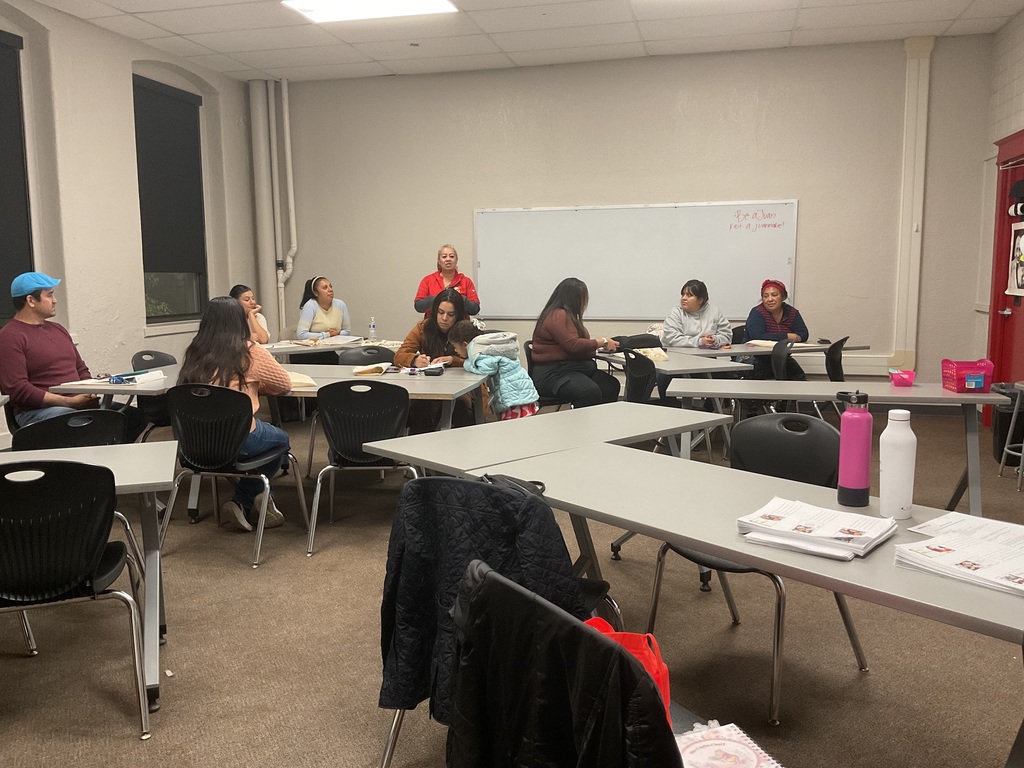 Parents sharing their opinions in a meeting