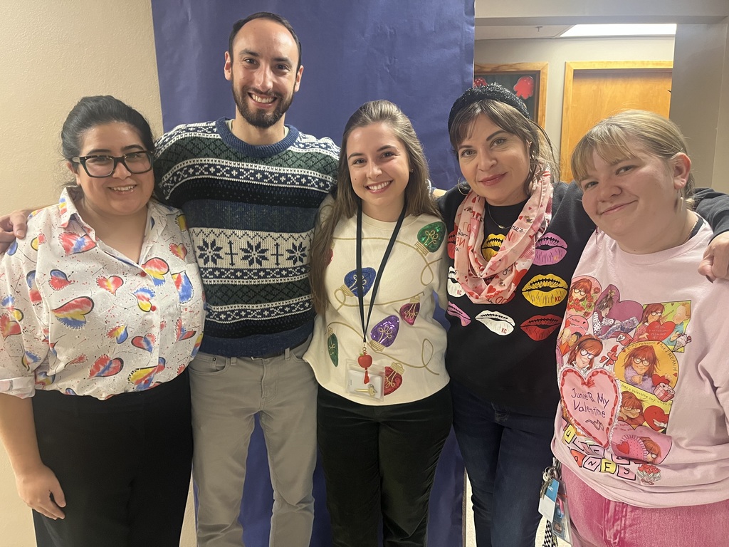 School staff during Spirit Week dressed in their favorite festive outfit