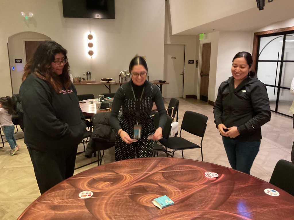 parent volunteers playing
