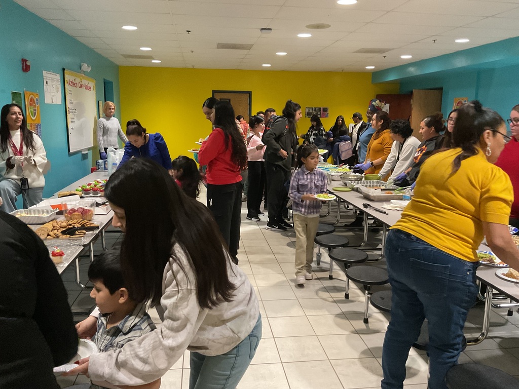 chool staff and parents enjoying the gathering together