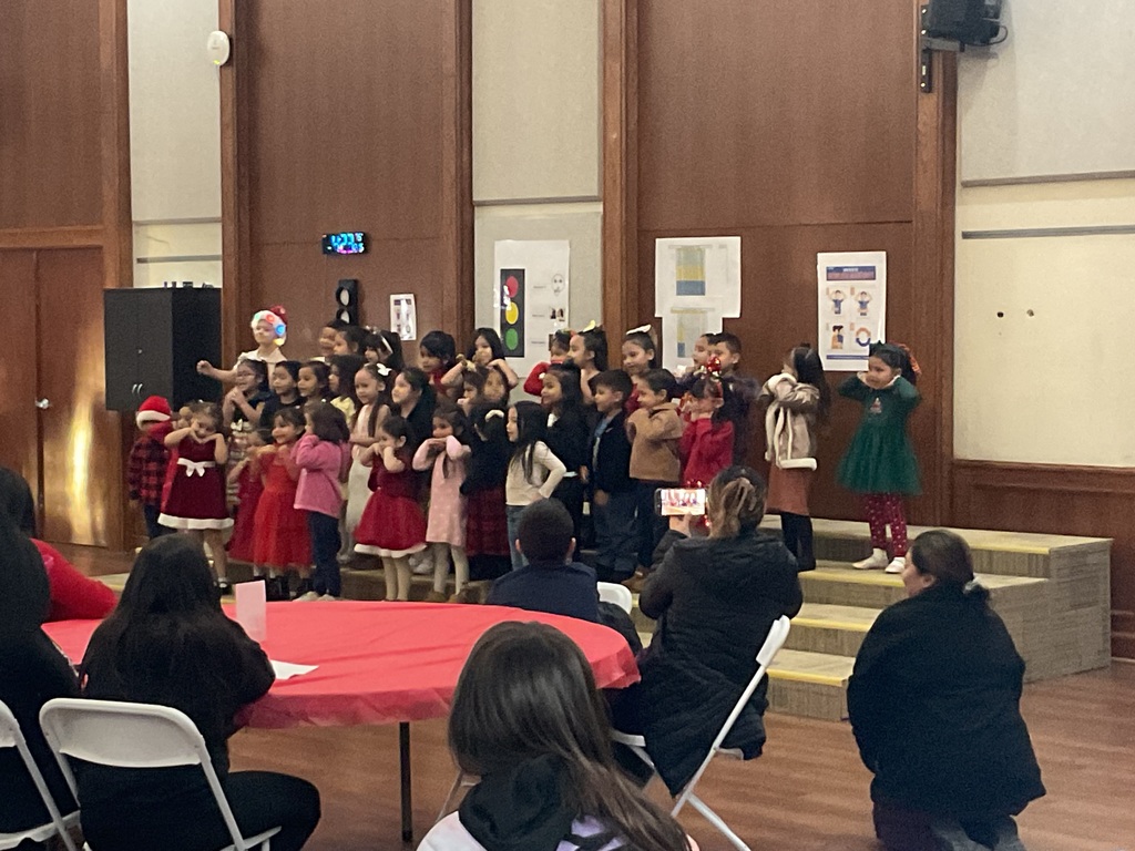 children singing and dancing