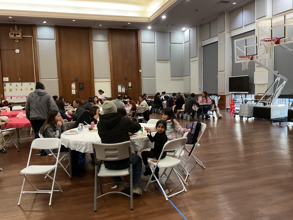 chool staff and parents enjoying the gathering together