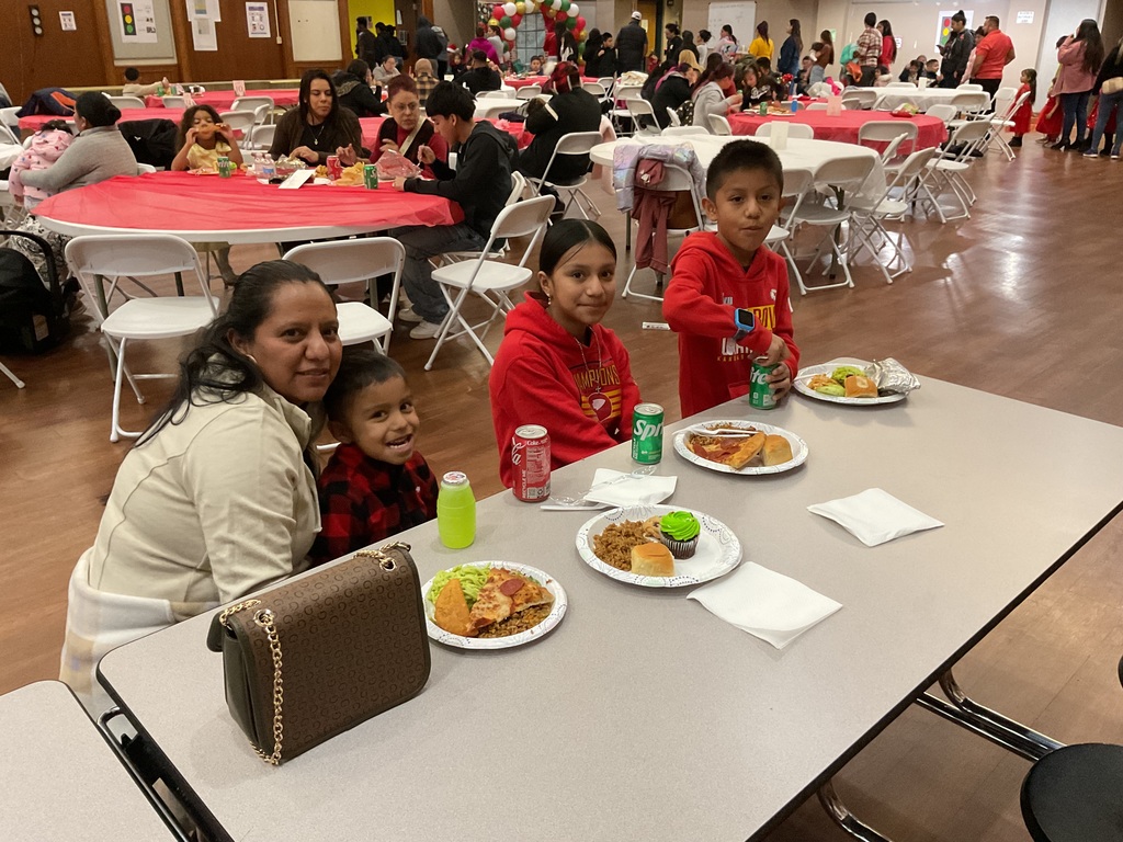 Family enjoying the assembly