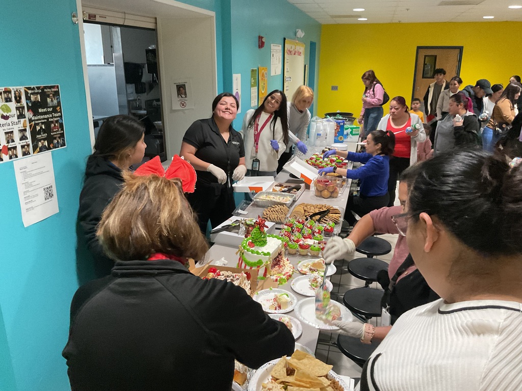 chool staff and parents enjoying the gathering together