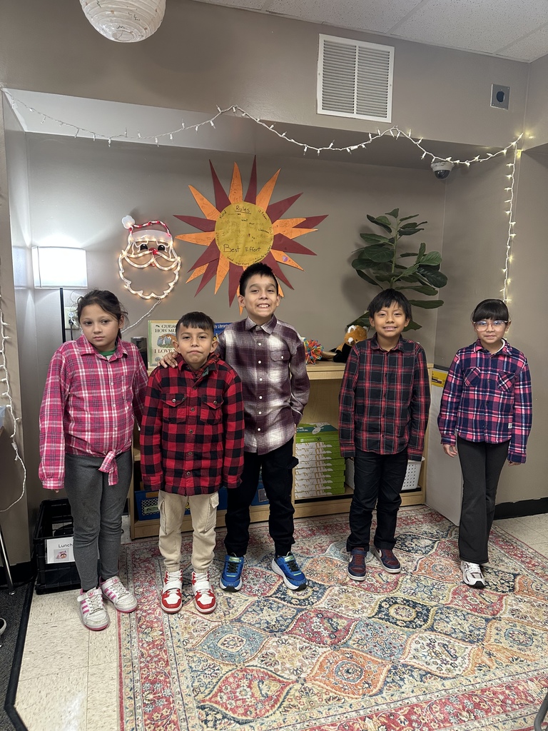 Kids showing off their spirit by wearing plaid
