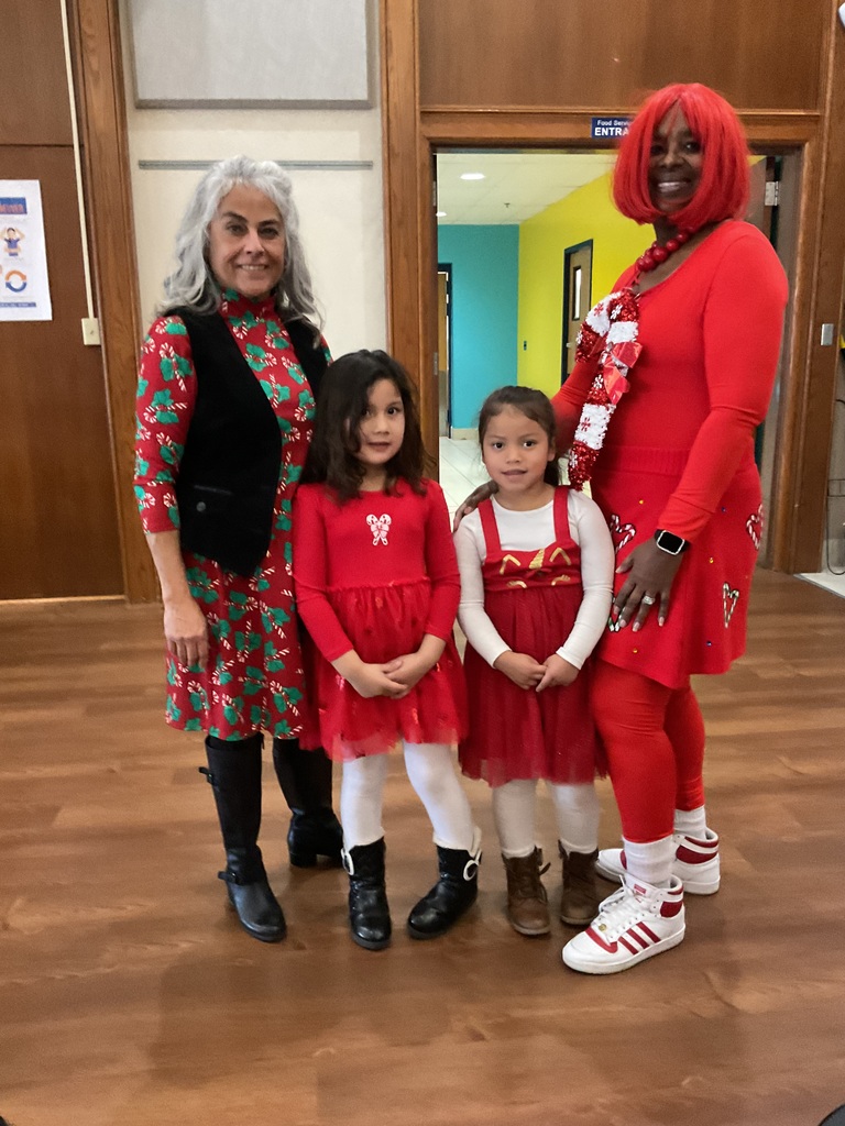 Kids showing off school spirit wearing white and red