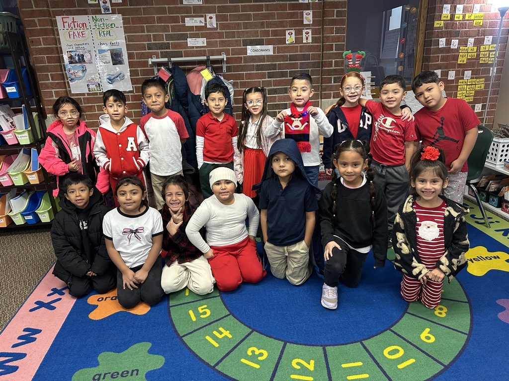 Kids showing off school spirit wearing white and red 