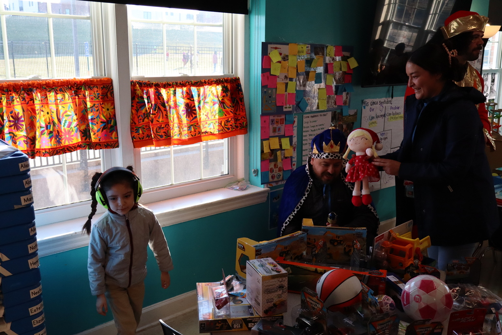 Children enjoying a day where they were given a toy