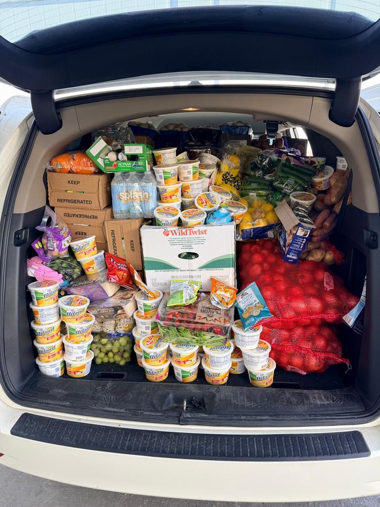 food in the truck of a van