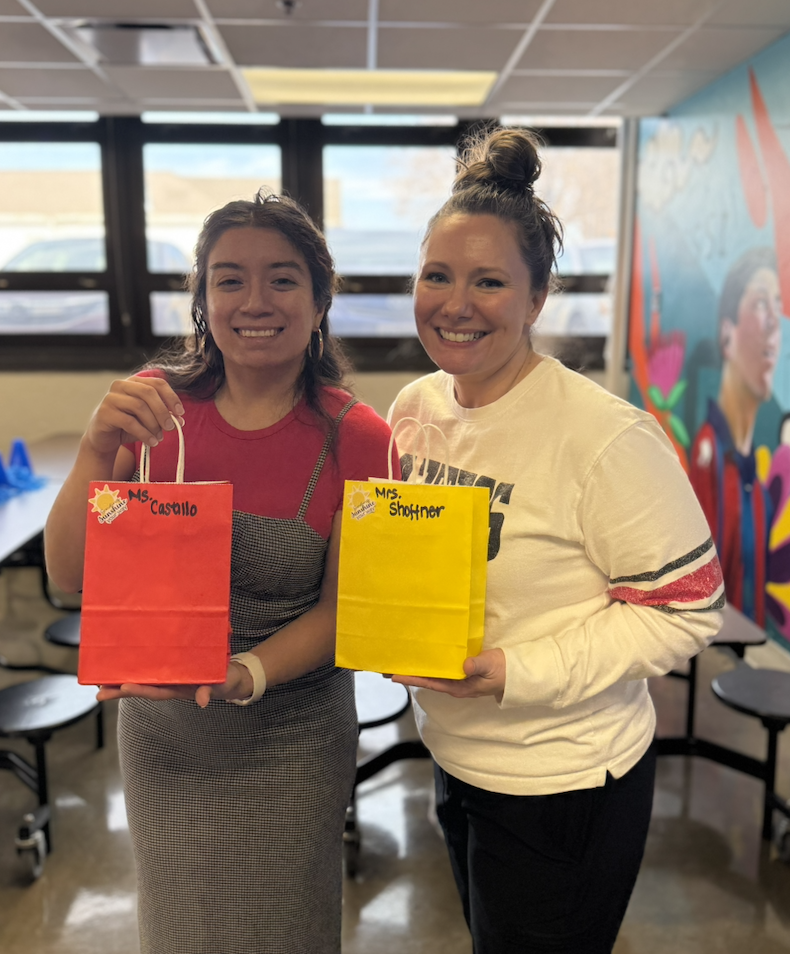 Ms. Castillo and Mrs. Shoffner holding their gifts
