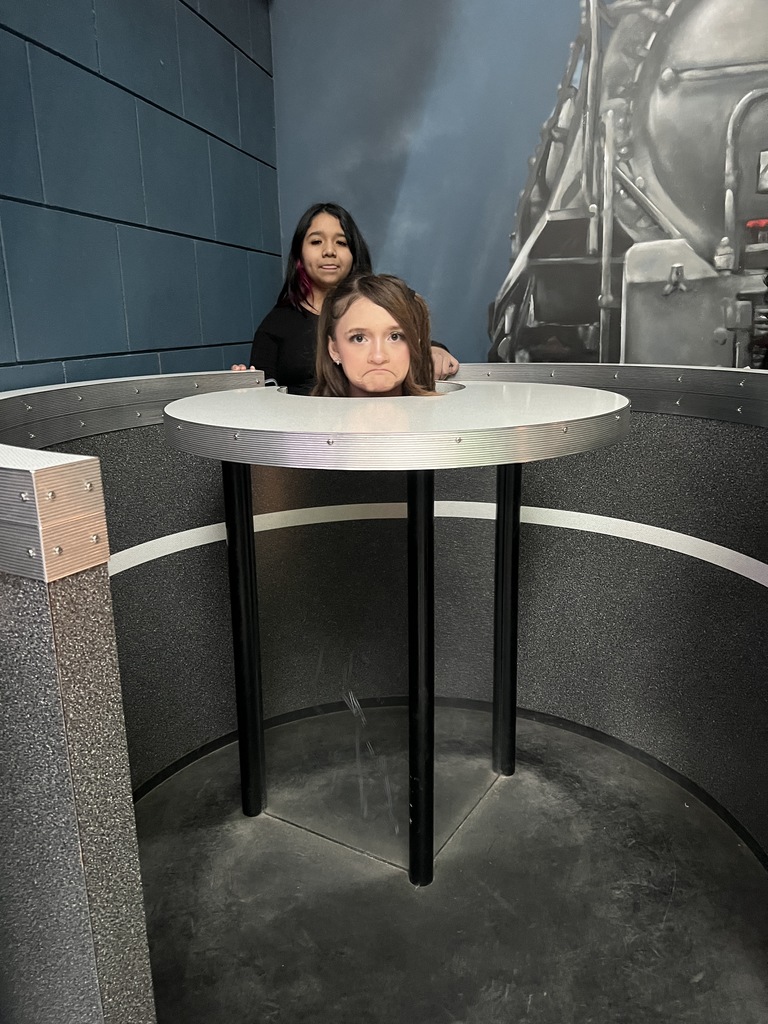 student at the illusions side of science city