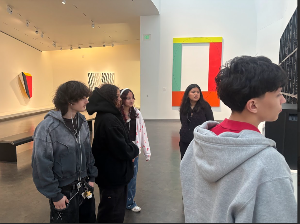 students looking at art