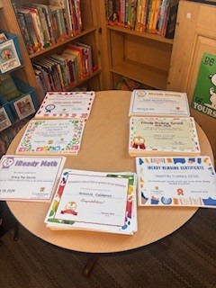 Picture of students certificates on a table