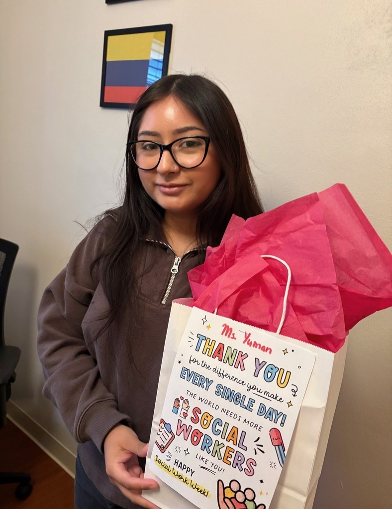social worker holding a gift bag