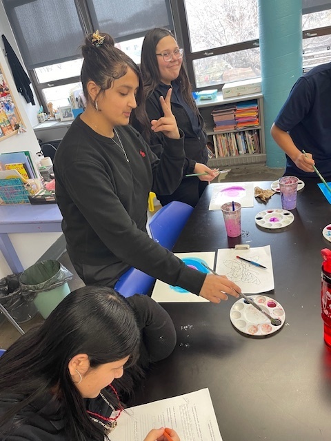 students painting in Dr. Wright's class