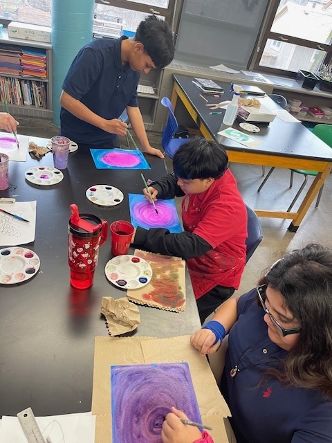 students painting in Dr. Wright's class
