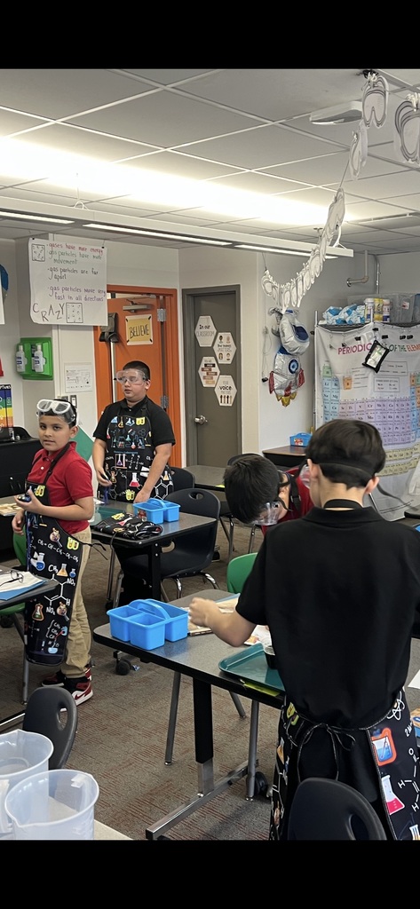 kids in a activity in science class