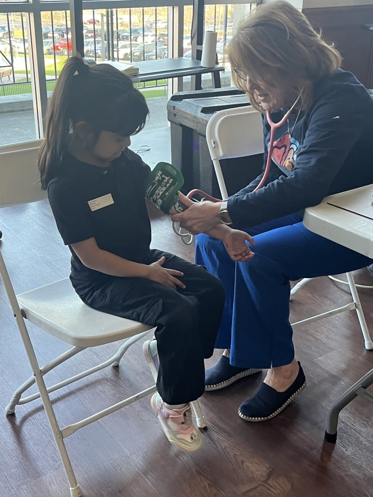Nurse taking blood pressure 
