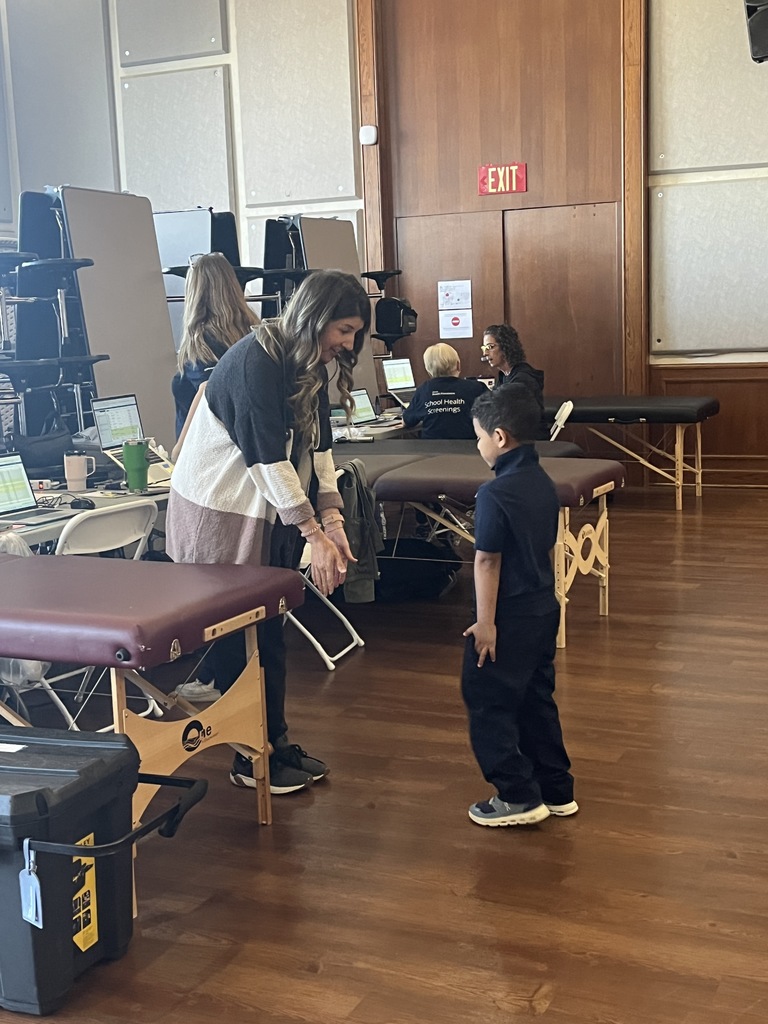 Nurse and student doing a health assessment 