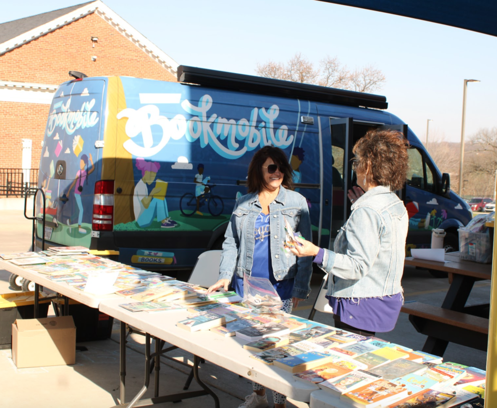 book mobile with 2 people talking to eachother