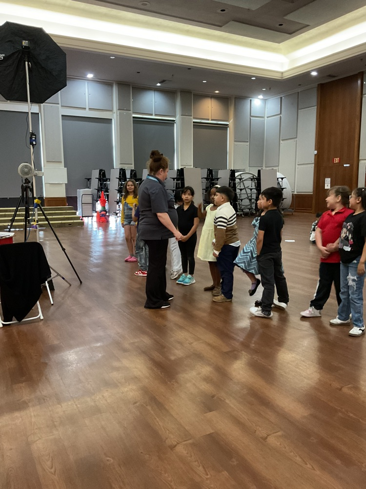 students getting ready to take a professional picture