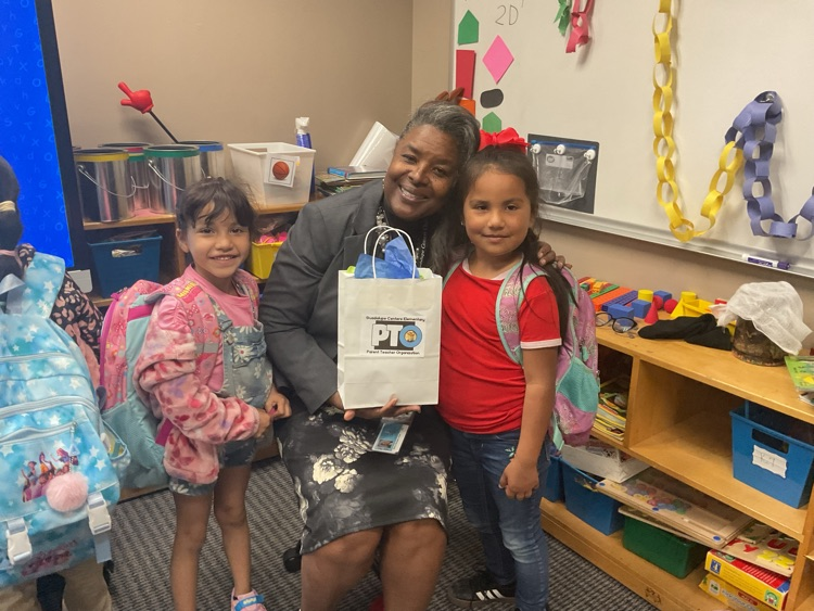 picture of paraprofessional with students