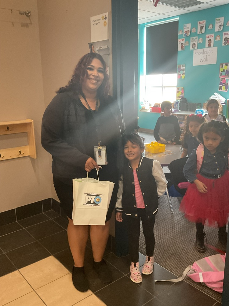 picture of paraprofessional with students