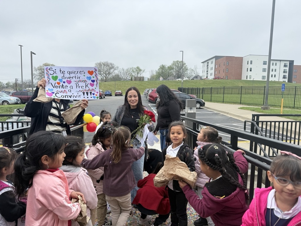 Assistant Principal receiving recognition from the students and staff of the Pre-K school.