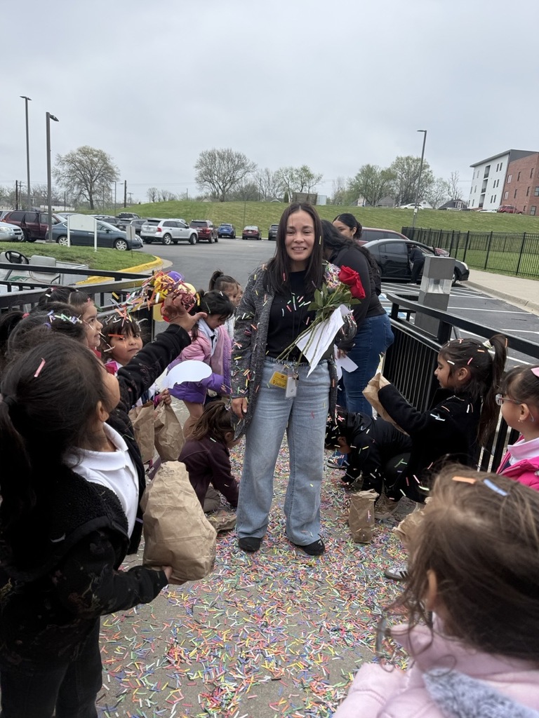 Assistant Principal receiving recognition from the students and staff of the Pre-K school.