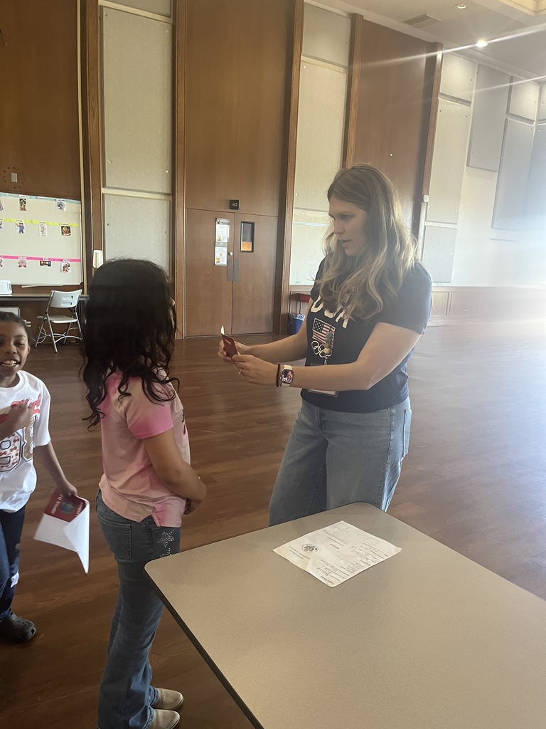 Student talking to teacher 