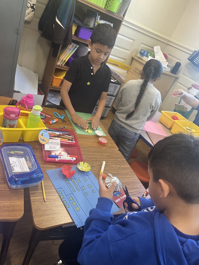 A group of students working on a craft