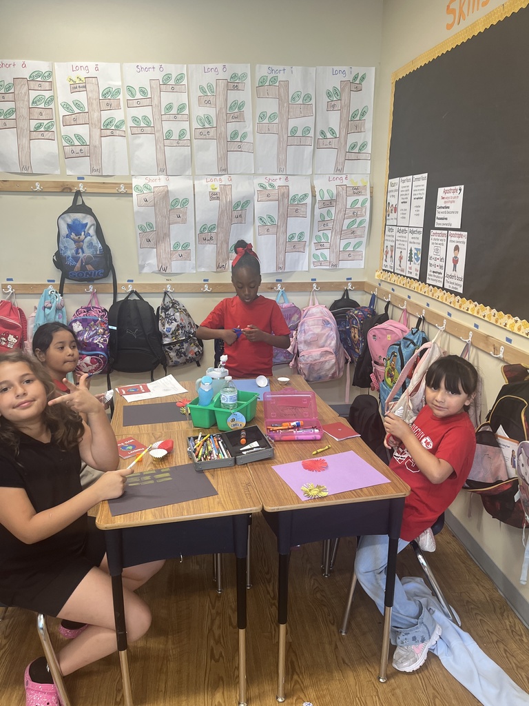 A group of students working on a craft 
