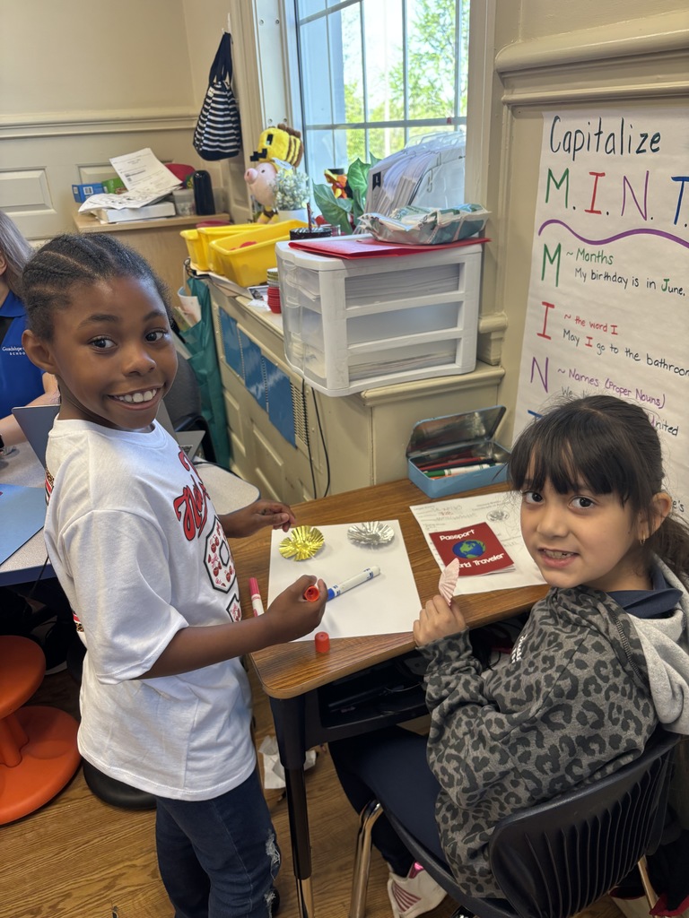 2 students working on a craft 