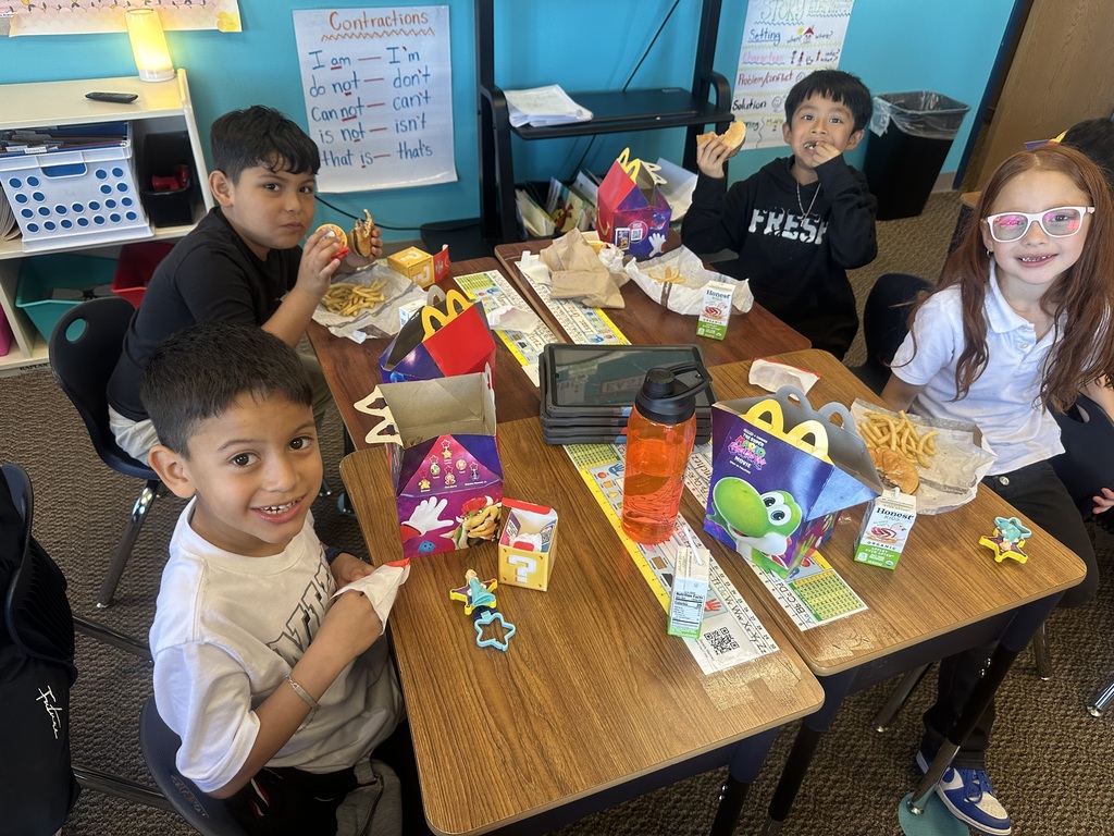 A group of student eating their happy meal