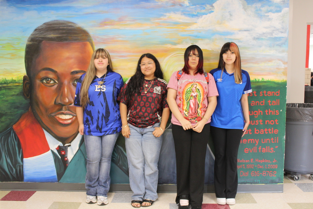 students posing for culture attire day