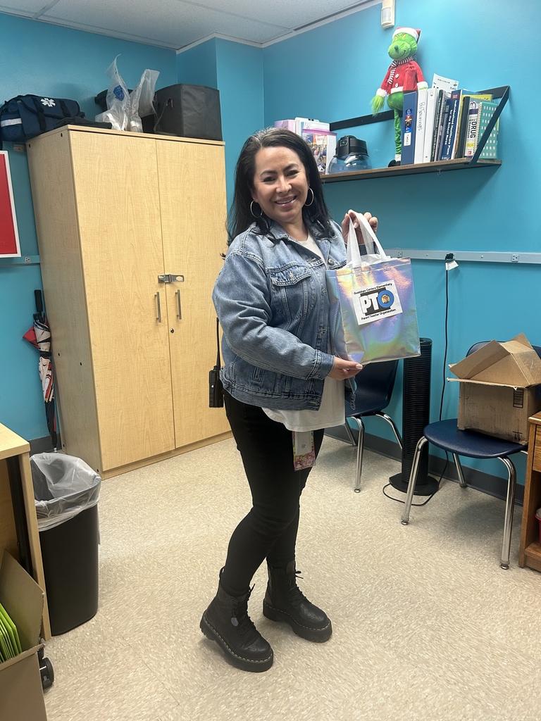 School nurse holding a gift 