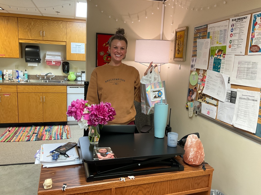 School nurse holding a gift