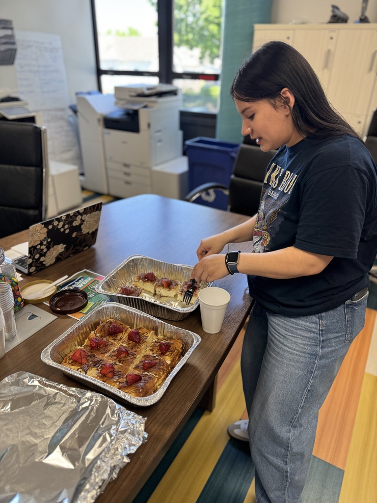 teacher grabbing churro cheesecake