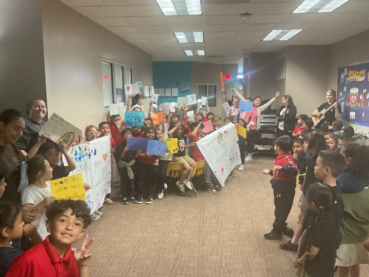 kids holding signs
