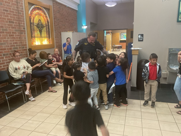kids around an officer