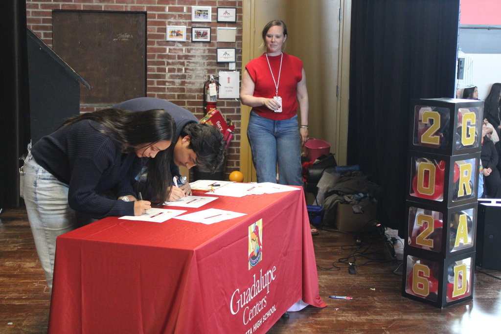 students signing