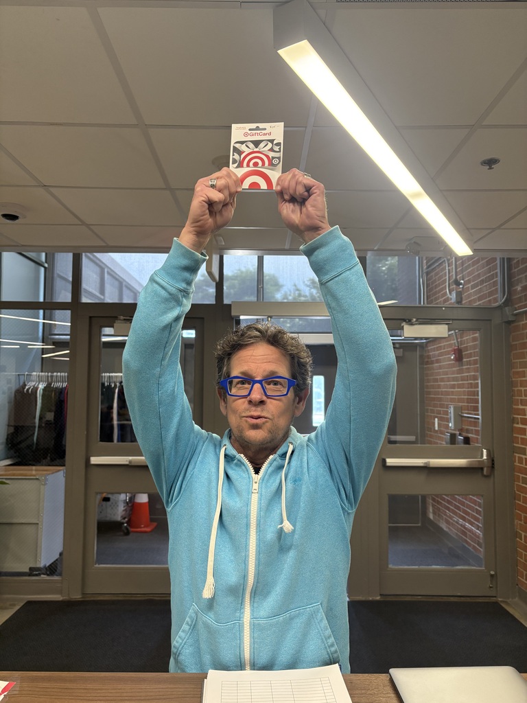 Pepin holding a target gift card