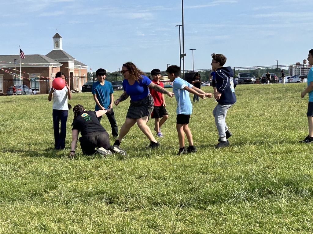 Students playing kickball