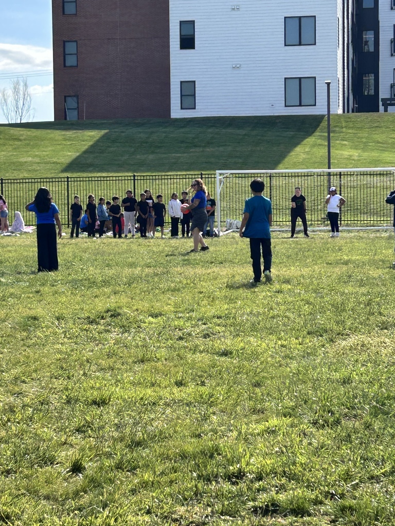 Students playing kickball