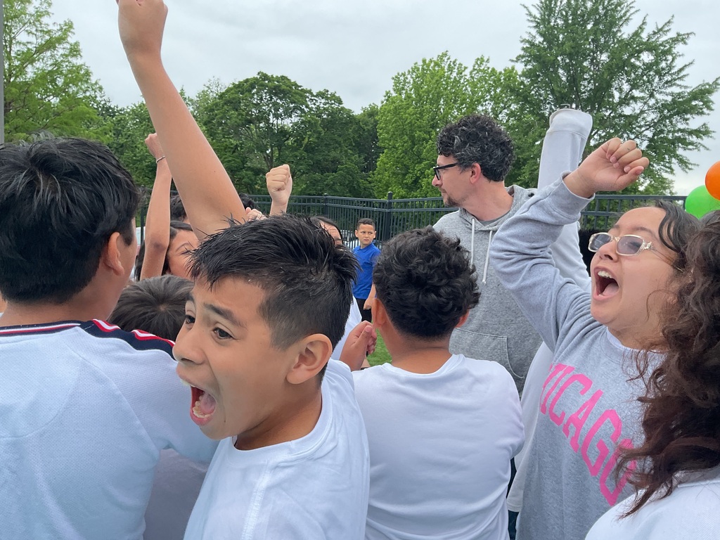 Kids cheering on