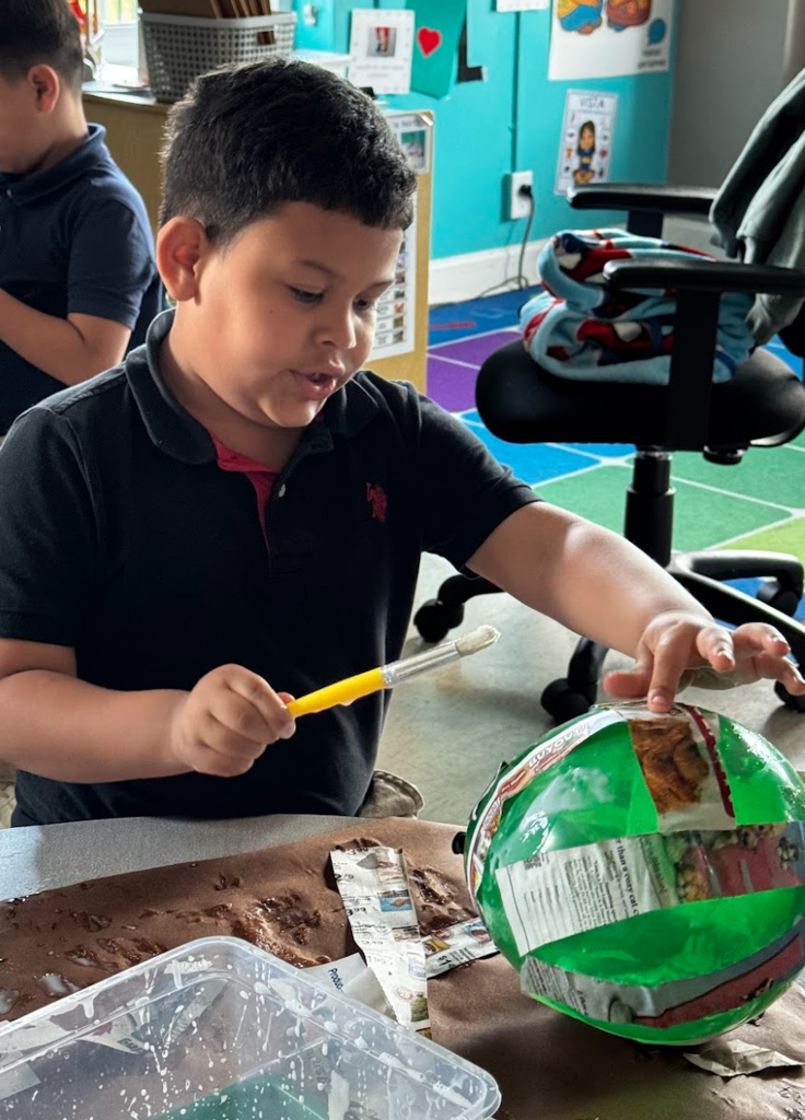 Prek Student painting